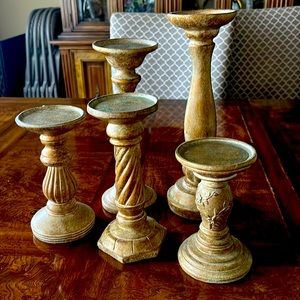 Five candlestick holders, antique gold